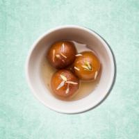 Cafe Gulab Jamun  · Village cheese dumplings deep fried and steeped in a cardamom infused sugar syrup  
