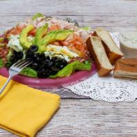 Cobb Salad · Turkey, eggs, bacon, bleu cheese crumbles, black olives, tomato and avocado.