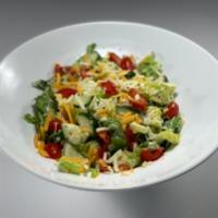 Tossed Salad · Romaine / Cucumber / Tomato / Shredded Cheese / House-Made Peppercorn Ranch