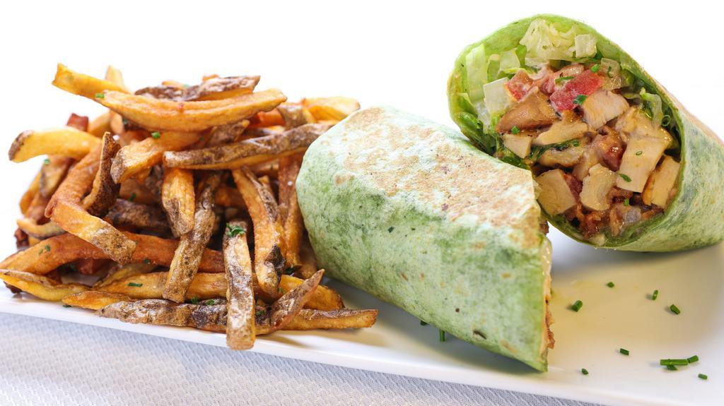 Chicken Bacon Ranch Wrap · Chicken Breast / Bacon / Romaine / Tomato / Provolone / Onion / Ranch Dressing. 

Served with House-Cut Fries.