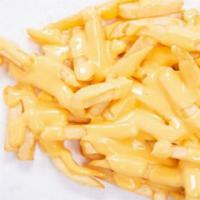 Cheese Fries · crispy fries topped with cheddar cheese.
