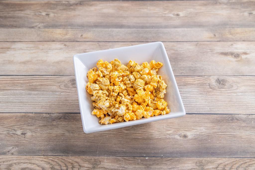Cornology Popcorn · Bag. Healthy hepp's, truffle Parmesan, double cheddar, movie pop, Chicago mix, logemann caramel, sweet corn, daily grind, chocolate drizzle, and whole lot of nuts.