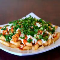 Buffalo Chicken Fries · Ingredients:  Chicken Meat marinated with original Buffalo Sauce. Fries, Mix of three kind o...