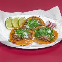 Birria Taco · Mini corn tortilla with our beef birria onions and cilantro