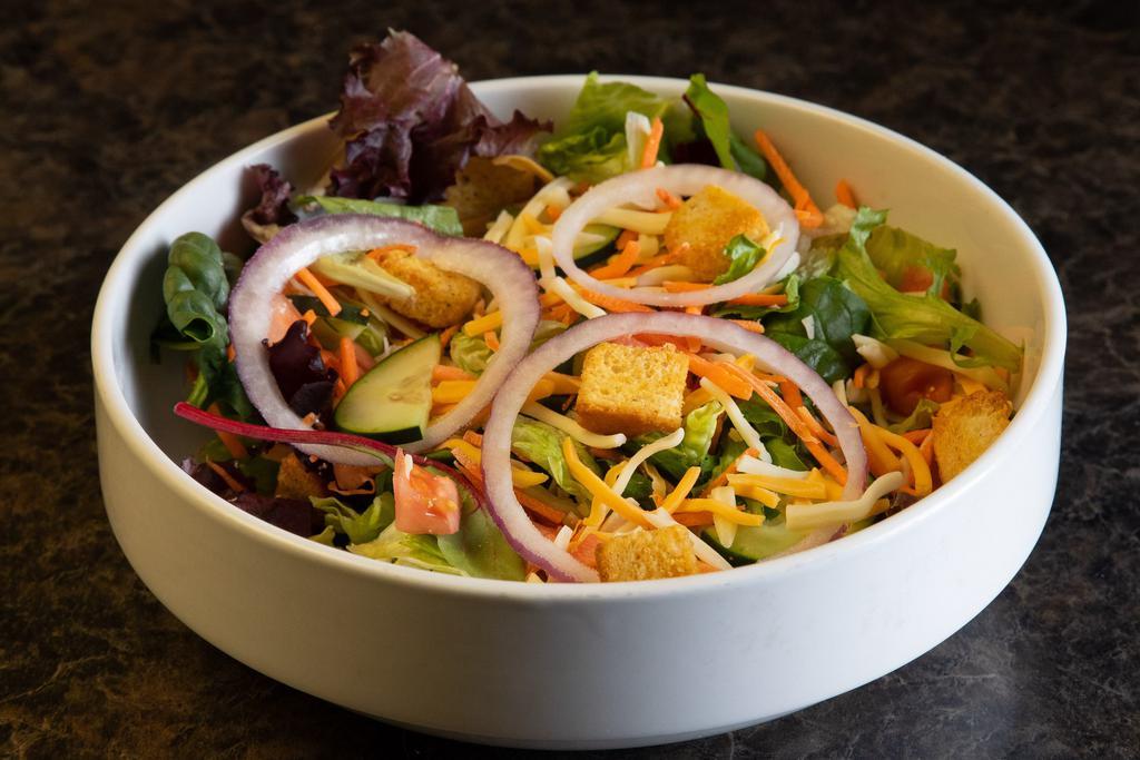 House Salad · A blend of mixed greens topped with tomatoes, cucumbers, carrots, red onions, cheddar Jack cheese and croutons.