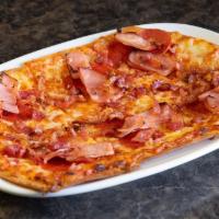 Meat Lovers Flatbread · Pizza sauce covered with our mozzarella blend, pepperoni, ham and bacon.