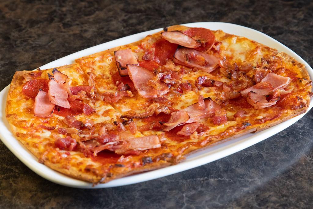Meat Lovers Flatbread · Pizza sauce covered with our mozzarella blend, pepperoni, ham and bacon.