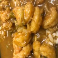 Shrimp Etouffee · Louisiana Crawfish tails cooked in a rich tomato based roux sauce and served over penne pasta.