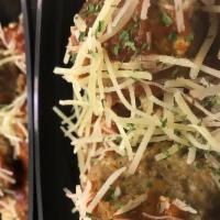 Turkey Meatballs over wheat pasta · Turkey Meatballs stuffed with zucchini, onions, and carrots.  Served on a bed of wheat pasta...