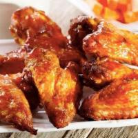 Spicy Chicken Wings · Spicy wings come with a side of BBQ sauce or ranch dressing.
