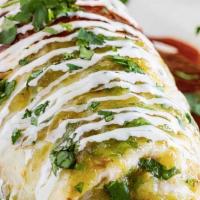 Bandera Burrito · Think super burrito but with red guajillo sauce and green tomatillo sauce smothered on top w...