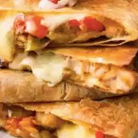 Super Quesadilla · Corn or flour tortilla with shredded Monterey Jack cheese, pico de gallo, sour cream, and ch...