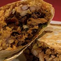 Regular Burrito · 10 inch tortilla with refried or whole pinto beans, rice, and your choice of meat
