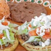 Sope Plate · Two sopes with pico, lettuce, cheese and your choice of meat with a side of rice and beans.
