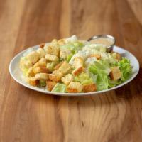 Caesar Salad · Romaine lettuce tossed with Parmesan cheese, croutons and our Caesar dressing. Add chicken f...