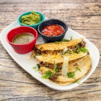 Mexican Street Style Taco Pack Feed Up To Four · 4 Beef Tacos 4 Steak Tacos 4 Chorizo Tacos served with a side of Red Sauce Green Sauce & Sou...