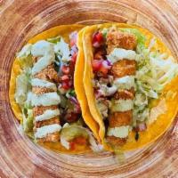 2 Crispy Fish Tacos · Mahi-Mahi with corn tortillas, lettuce, pico and cilantro sauce.