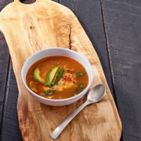 Tortilla Soup chicken · With marinated grilled chicken, fresh avocado, cheese and tortilla strips.