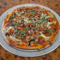 Combo Pizza · Ground lamb, pepperoni, chicken, mushrooms, bell pepper, onion and olives.