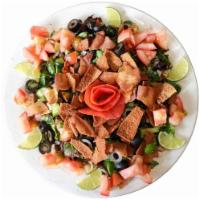Fattoush Plate · Fava bean, tomato, parsley, lemon, garlic and olive oil. Vegetarian.