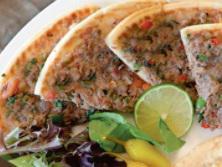Lahm Bi Ajeen Flatbreads · Grounded lamb meat, onions, tomato and green bell pepper.

