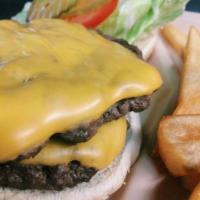Double Cheeseburger · Served with lettuce, tomato, onion, mayonnaise and pickle.