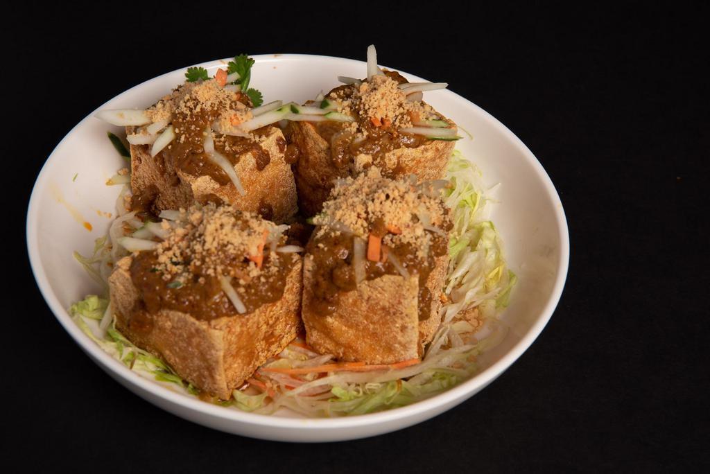 A8. Satay Tofu · Crispy fried tofu stuffed w. cucumber & bean sprouts,seved w.peanut sause. （Most popular item）
