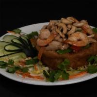 C3. Sarang Burong · shaped fried taro stuffed w.chicken,shrimp,snow peas,mushroom,corn,red&green pepper topped w...