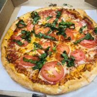 Margherita Pizza · Red sauce, tomato, and basil.