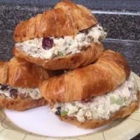 Cranberry Walnut Chicken Salad Panini · Homemade cranberry walnut chicken salad served on a grilled buttery croissant.