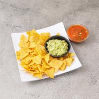 Guacamole, Chips and Salsa · Hand made mashed avocado with cilantro, onions and tomatoes with chips. Vegetarian.
