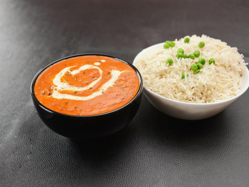 Butter Chicken · Oven grilled chicken sauteed in butter and cooked in cream and tomato sauce.
