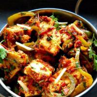 Kadai Paneer · Paneer and vegetables cooked in tomato sauce and cream.