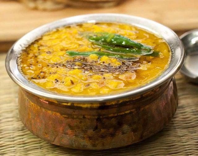 Dal Tadka · Indian lentils cooked in slow flame with fresh vegetable, seasoned with cumin and mustards.