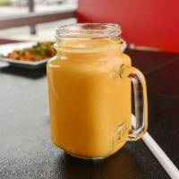 Mango Lassi · Creamy yogurt shake made with mango pulp served cold.