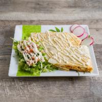 Pollo Quesadilla de Harina · Chicken/
The quesadilla comes with lettuce, tomatoes, sour cream and cotija cheese. 
Las que...