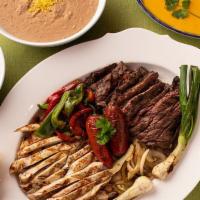 Family Style Fajitas - Beef · Feeds up to 4. Grilled Fajita Beef with grilled onions and bell peppers. Served with Guacamo...