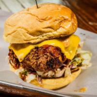 SaHotChick(en) Sandwich · Breaded and fried, tossed in hot sauce , house pickles, American cheese, jalapeno-honey slaw...