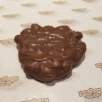 Milk Chocolate Almond Bear · Roasted almonds and chewy caramel enrobed in milk chocolate