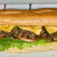 Philly Cheese Steak Sandwich · Steak, Pepper, onion ,American cheese,  Lettuce , Tomato & mayo On a  Hero