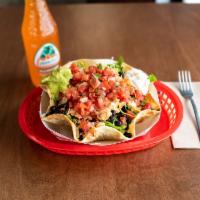 Taco Salad · Lettuce, choice of black, pinto or refried beans, choice of meat, cheese, fresh Roma salsa, ...