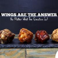 1 Wing · Cooked wings of a chicken coated in sauce or seasoning. 