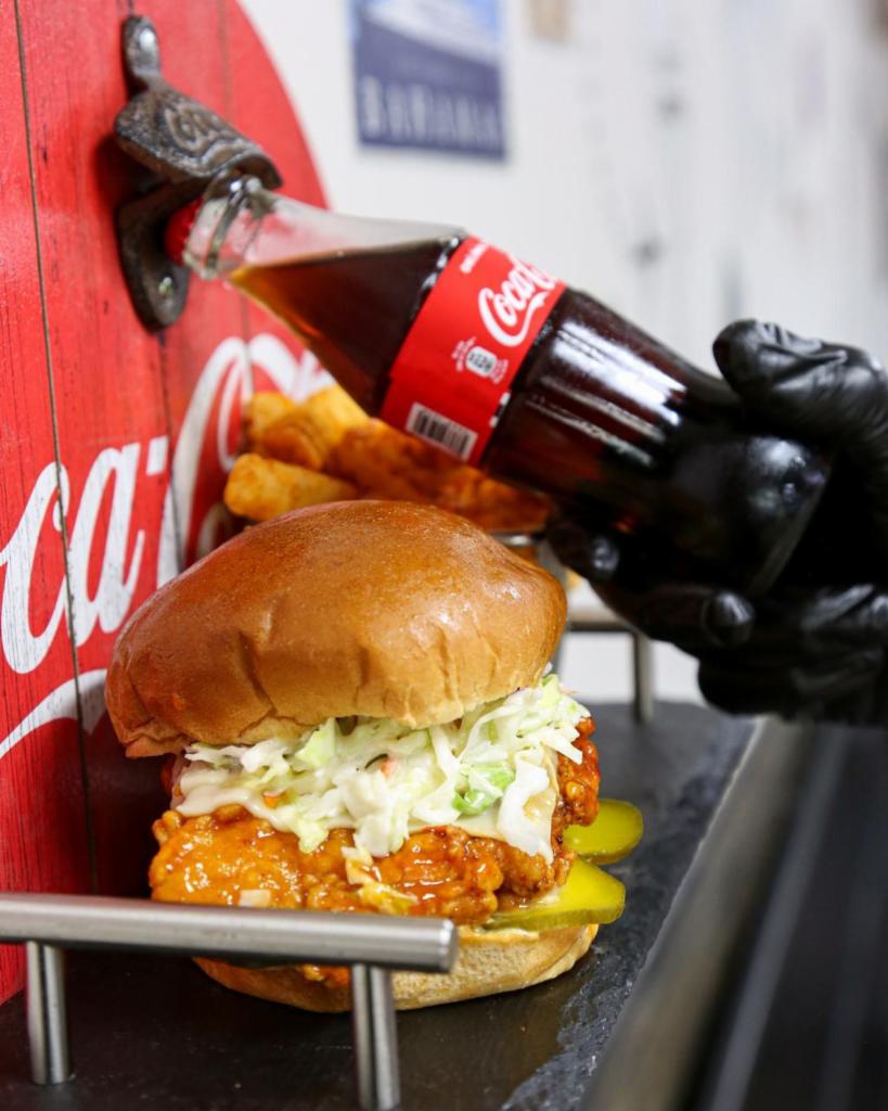 Crispy Chicken Burger Combo · Farooj sauce, lettuce and pickles. Comes with fries & drink.