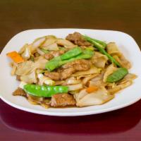 Drunken Noodles · Rice noodles stir fried in a spicy basil sauce with chilies. Spicy.