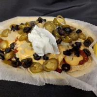Nachos · Tortilla chips with nacho cheese