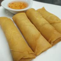 Spring Roll (4) · Crispy vegetable spring roll served with sweet chili sauce.