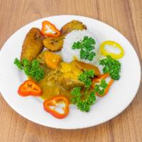 Curry Chicken · Served With your Choice Of Rice and Peas or white rice and 1 side of your Choice.