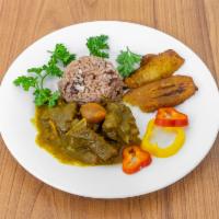 Curry Goat · Served With your Choice Of Rice and Peas or white rice and 1 side of your Choice.