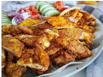 Chicken Suya · Chopped 1/4 leg-thigh chicken marinated in Nigerian seasonings, steamed and grilled, topped ...
