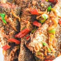 Fried Fish (Four count) · Peppered. Deep-fried fish garnished with red bell pepper, tomatoes, onions sauce.